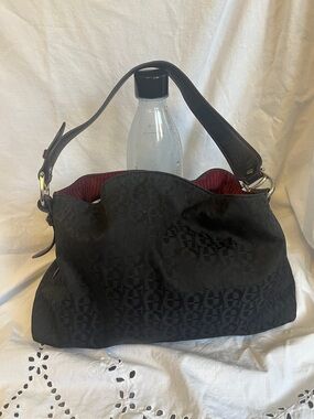 Classic Black Women’s Shoulder Bag with Red Striped Interior